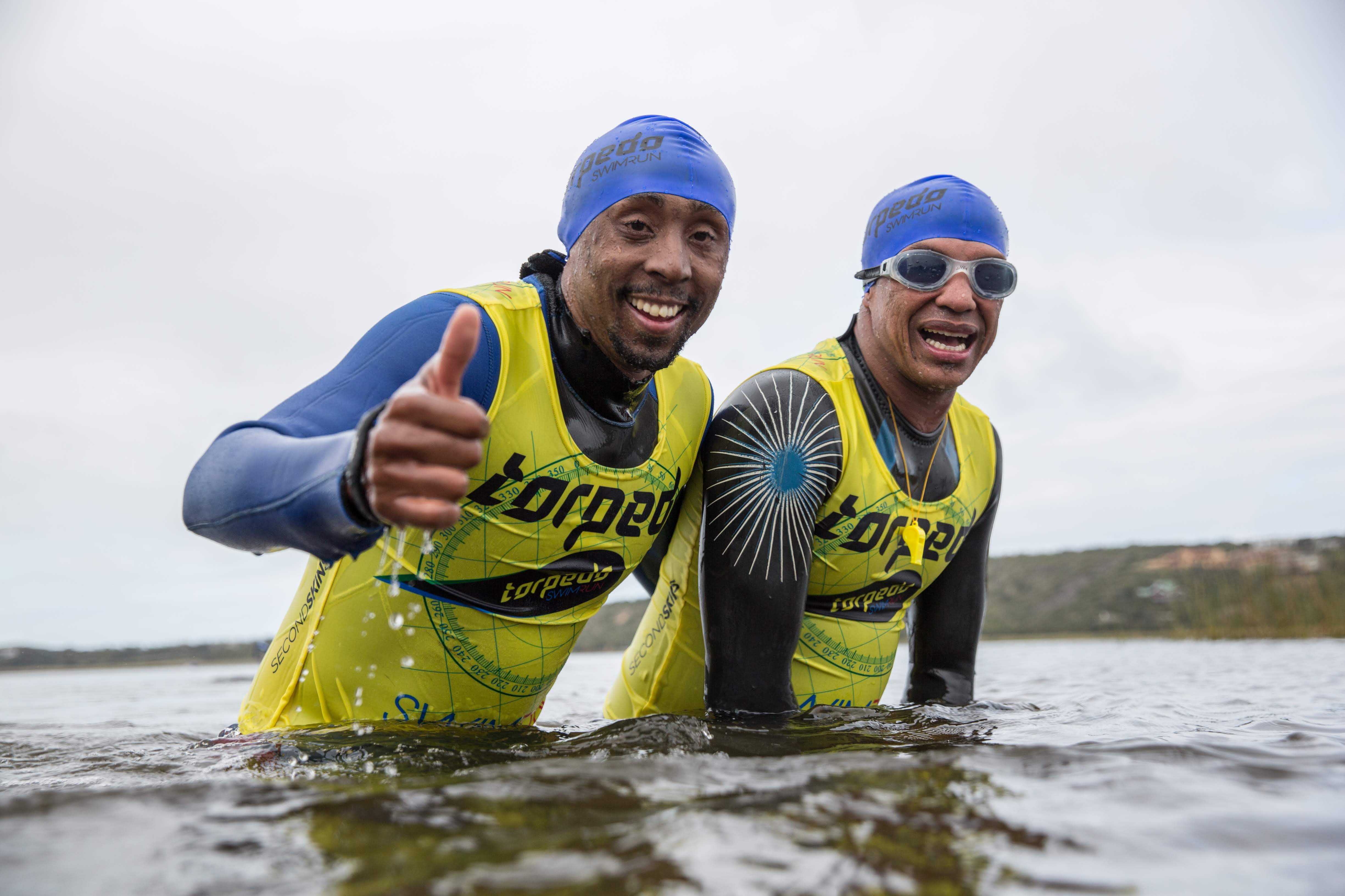 Torpedo SwimRun athletes celebrating in the water